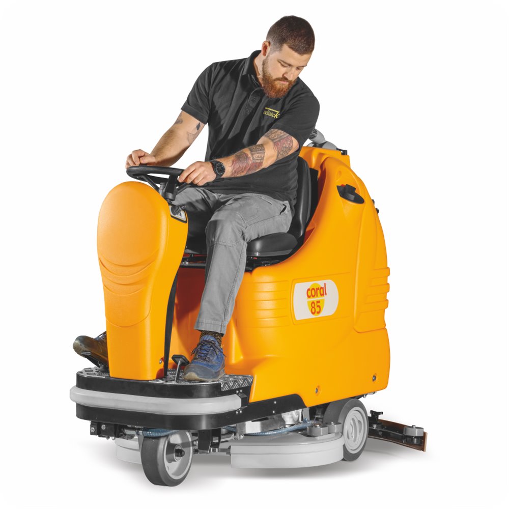 Man operating a Adiatek Coral 85 Ride On Auto Scrubber cleaning machine on a white background
