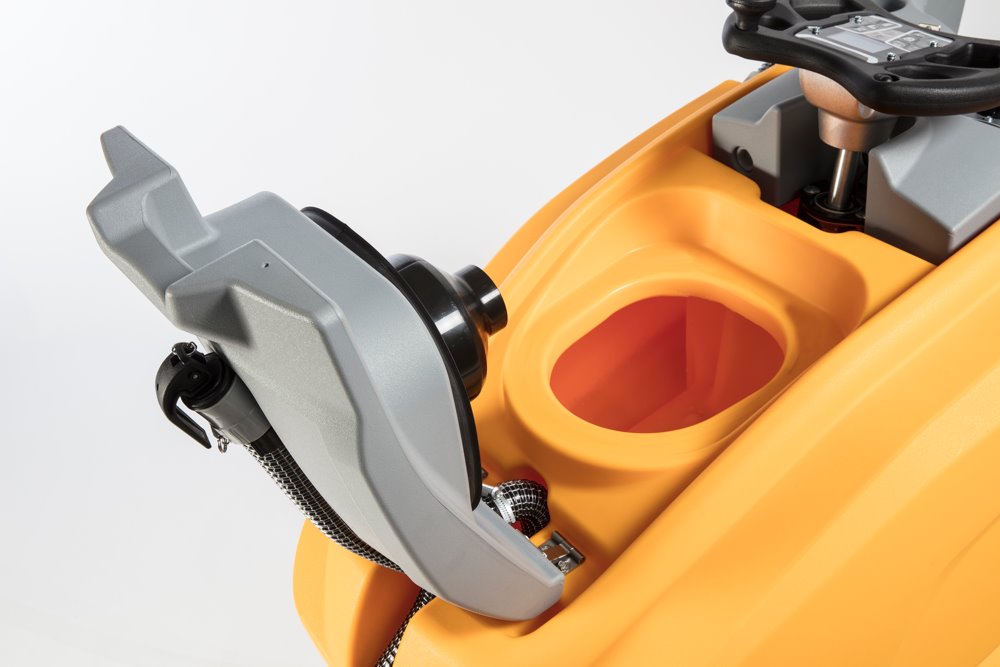 Close-up of a yellow Adiatek Quartz with an open solution compartment on a white background