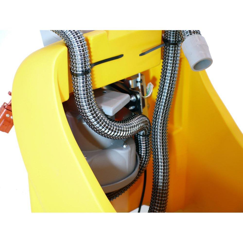 Close-up of a yellow Adiatek Ruby 50t Walk Behind Floor Scrubber machine with metallic hoses on a white background