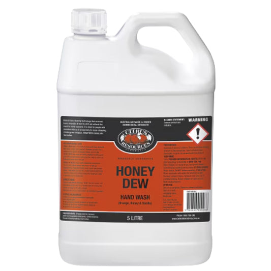 White bottle of 'Honey Dew' hand wash with a red label on a white background