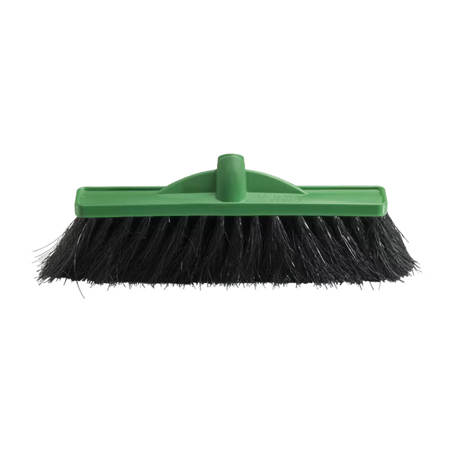 Green broom with black bristles on a white background