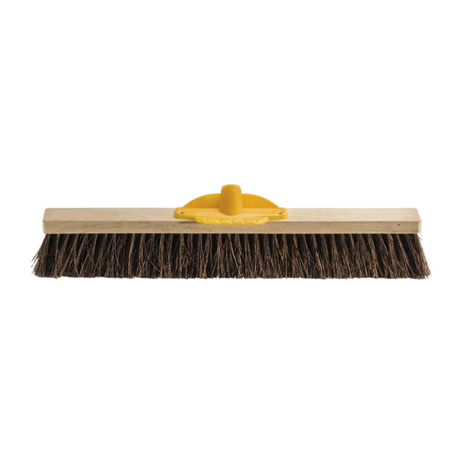 Brush with wooden handle and bristles on a white background