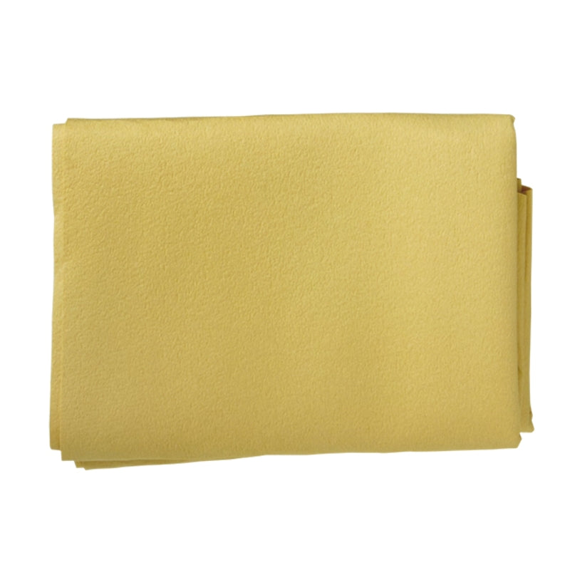 Folded yellow fabric cloth on a white background