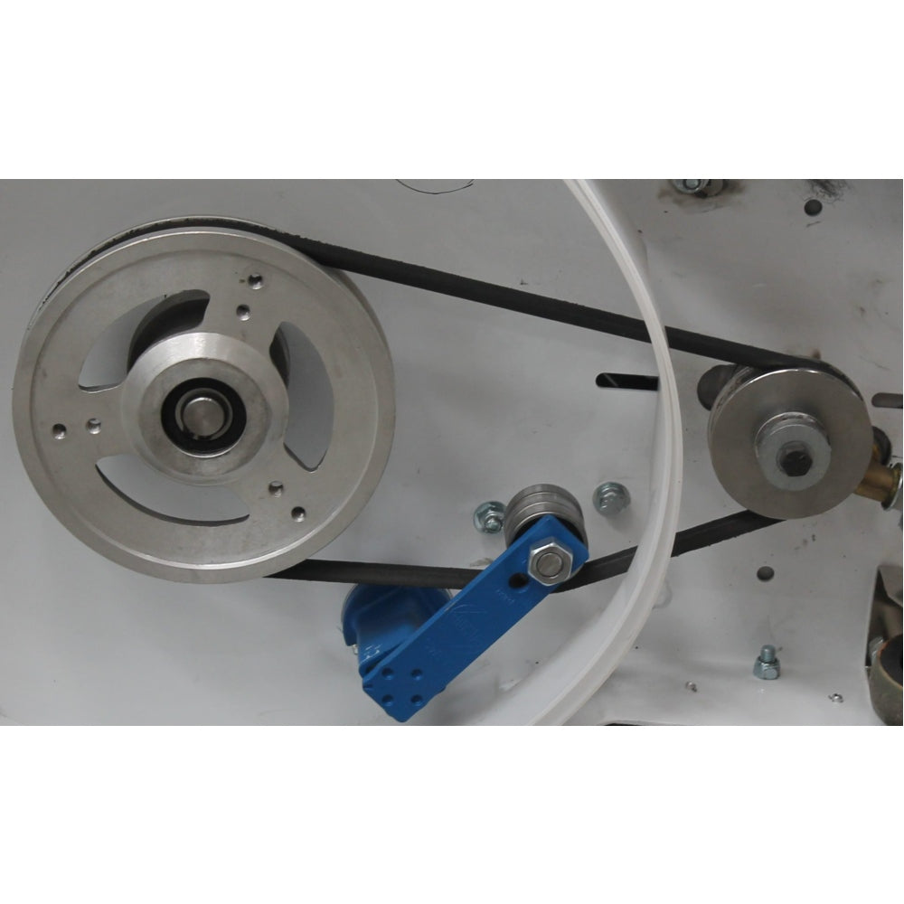 Close-up of mechanical components with a belt and pulleys on a white background