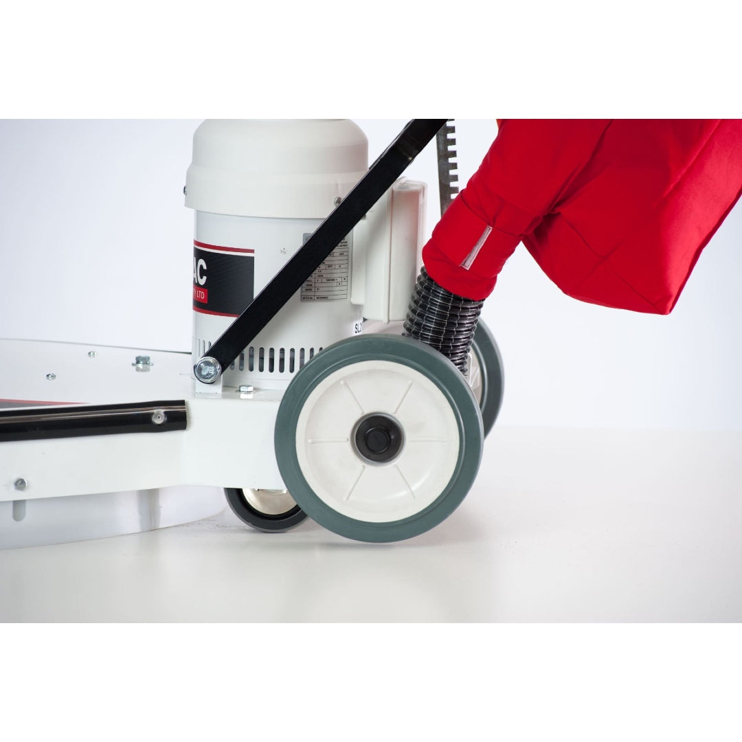 Close-up of a Polivac SL2000 Stingray floor polisher with a red-sleeved hand guiding it on a white surface.