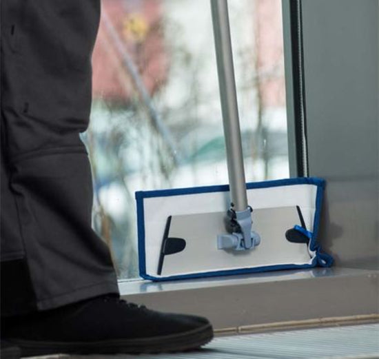 Vileda Express Pro Velcro Mop Frame in use on window