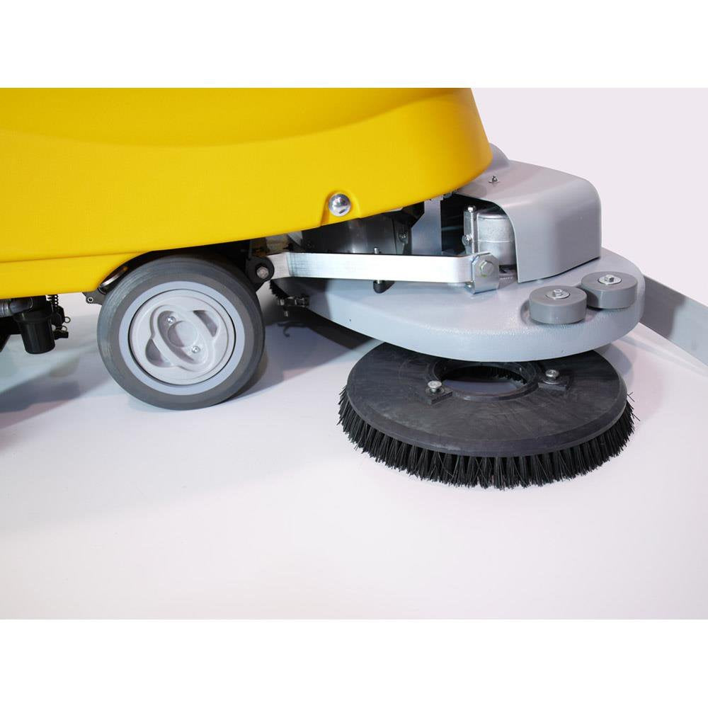 Close-up of a yellow Adiatek Amber 83 floor cleaning machine with a brush on a white background