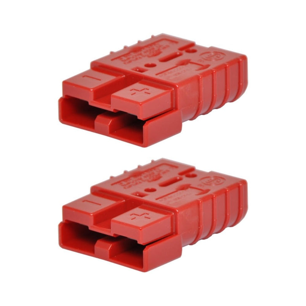 Two red Anderson battery connectors on a white background