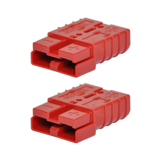 Two red Anderson battery connectors on a white background