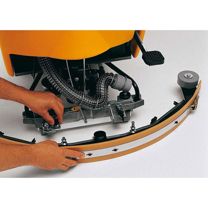 Close-up of a person adjusting scrubber blades on a cleaning machine with a white background