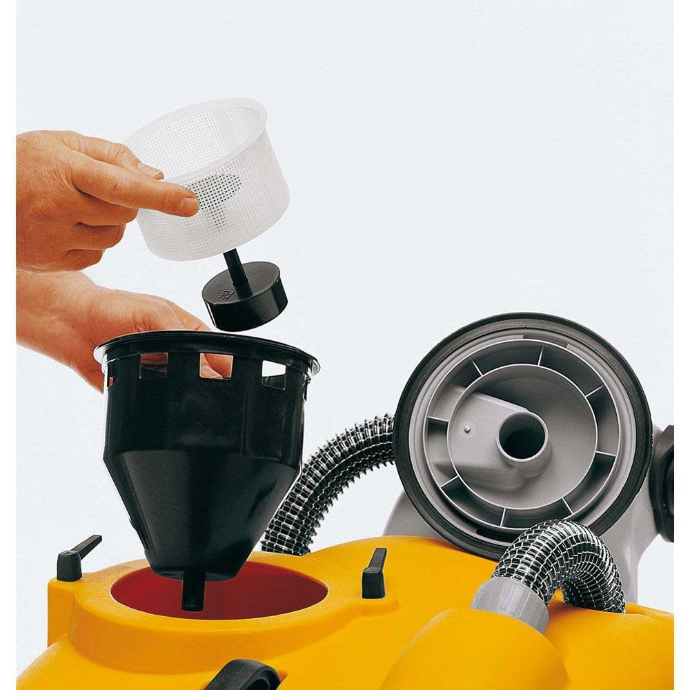 Hand replacing a filter on a yellow Adiatek Jade 50t machine with a white background