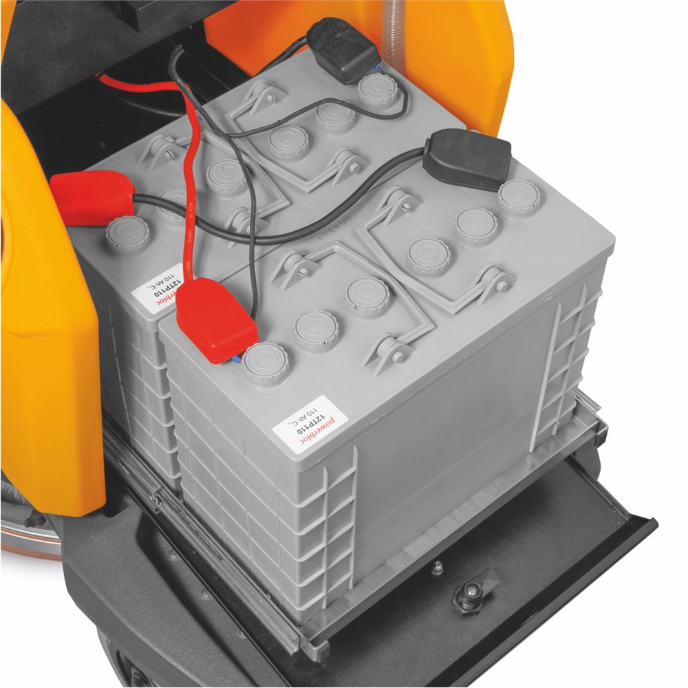 Close-up of a battery with cables attached on a white background