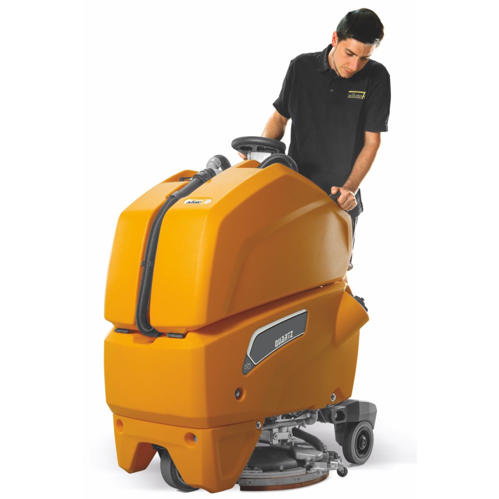 Person operating a large orange Adiatek Quartz 50 floor cleaning machine on a white background