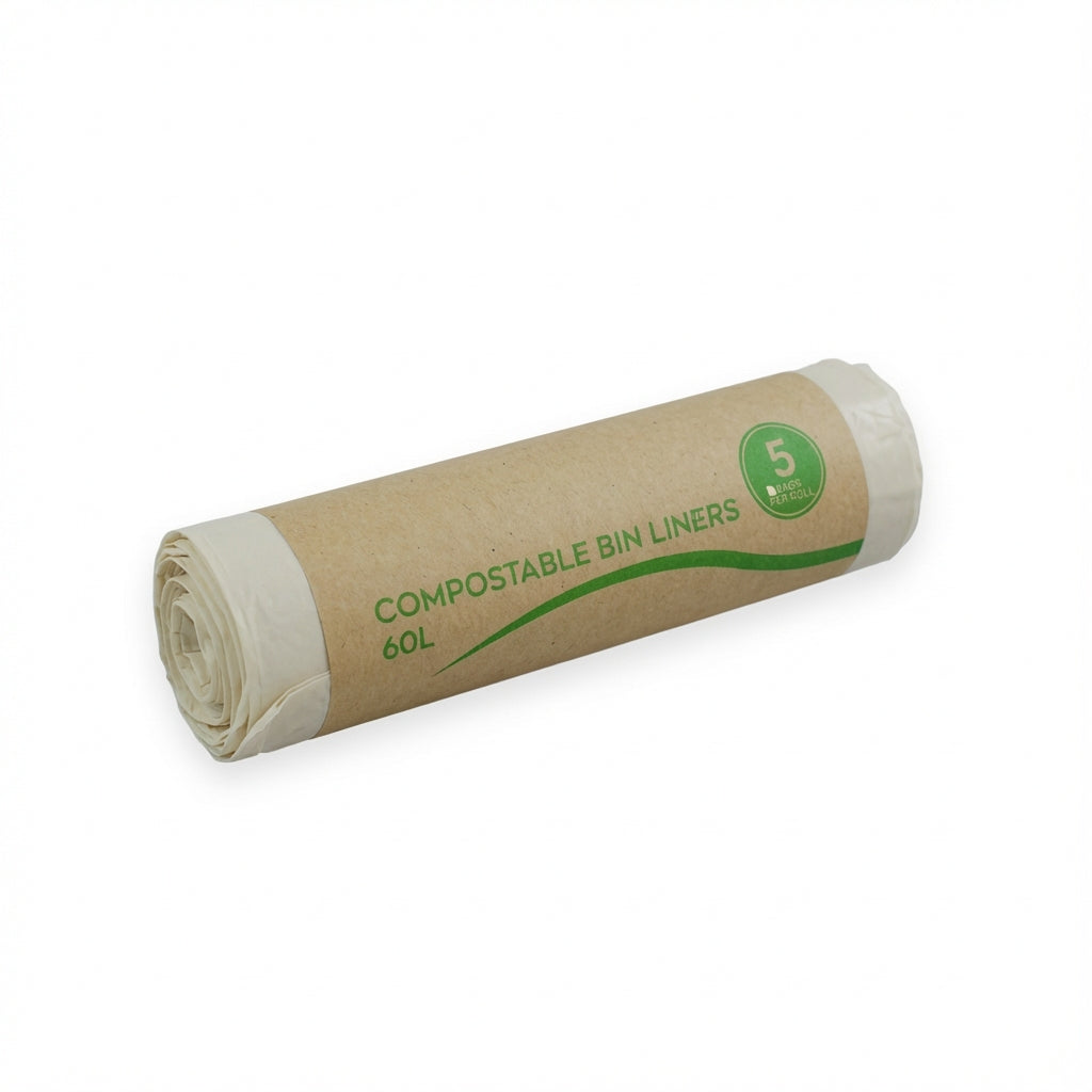Roll of compostable bin liners with green text on a white background
