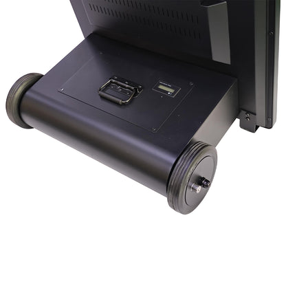 Close-up of a black electronic device with ports on a white background