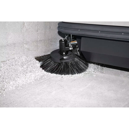 Close-up of a Comac CS120B Ride On Sweeper cleaning brush