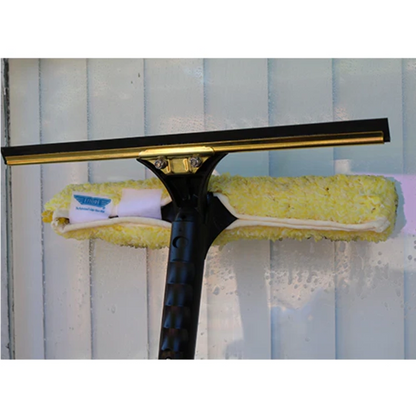 Window cleaning tool with squeegee and microfiber pad on a white background