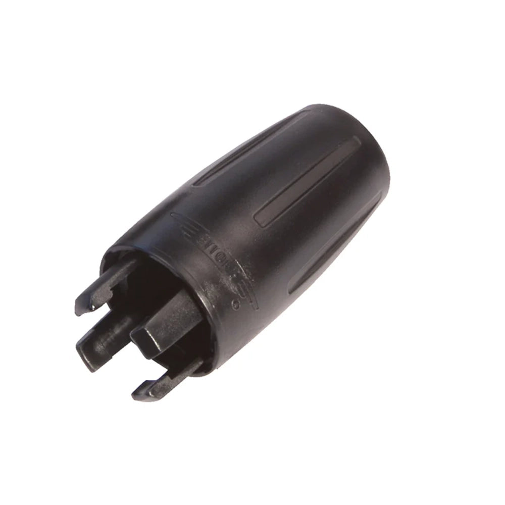 Black plastic component on a white background