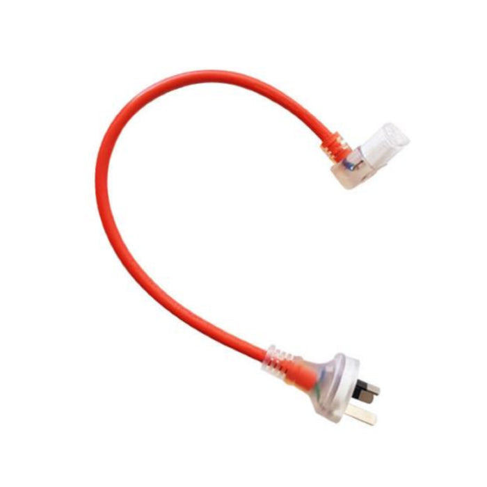 Red electrical cable with plug on a white background
