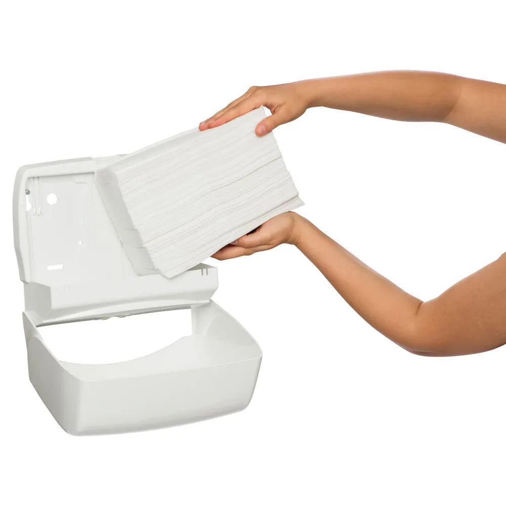 White plastic container with a lid, holding white cloths, against a white background.