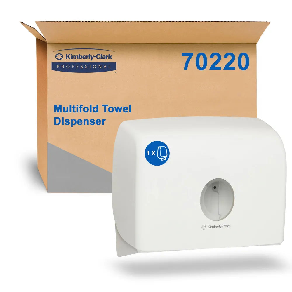 White towel dispenser with Kimberly-Clark packaging in the background