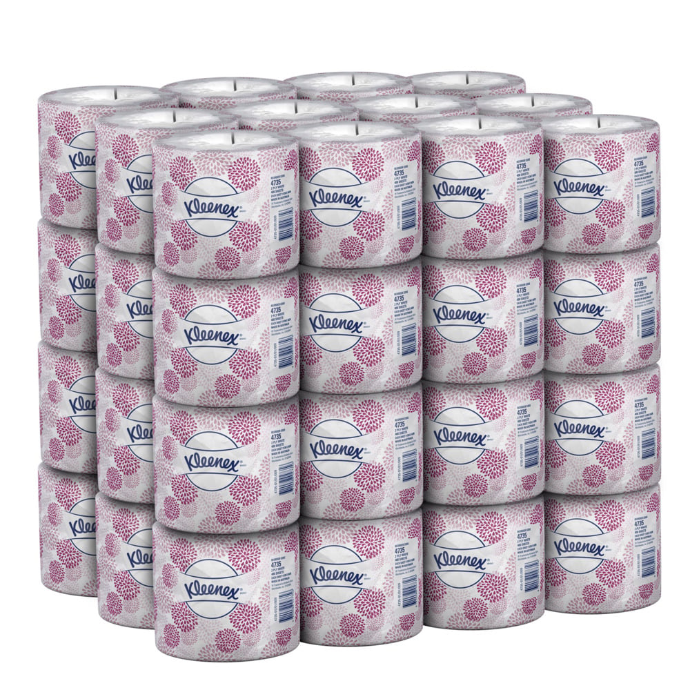 Stack of Kleenex facial tissue rolls on a white background