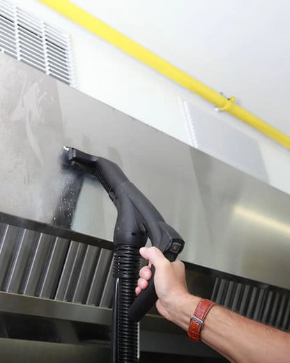 Person cleaning a metallic surface with a Novaltec Black Hawk Virucide.