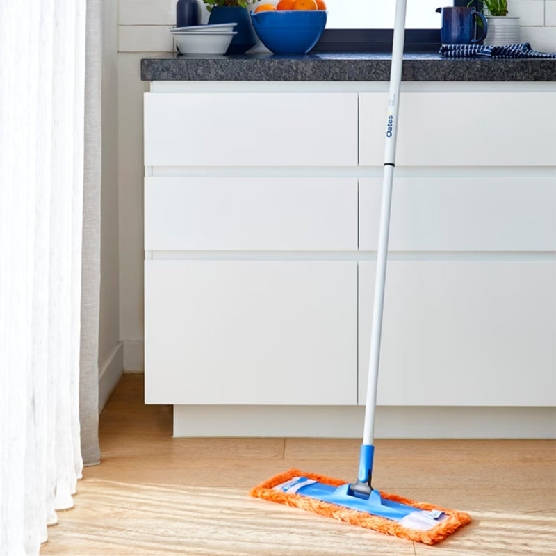 Oates Triple Action Sweep and Dust Mop Refill Red in use