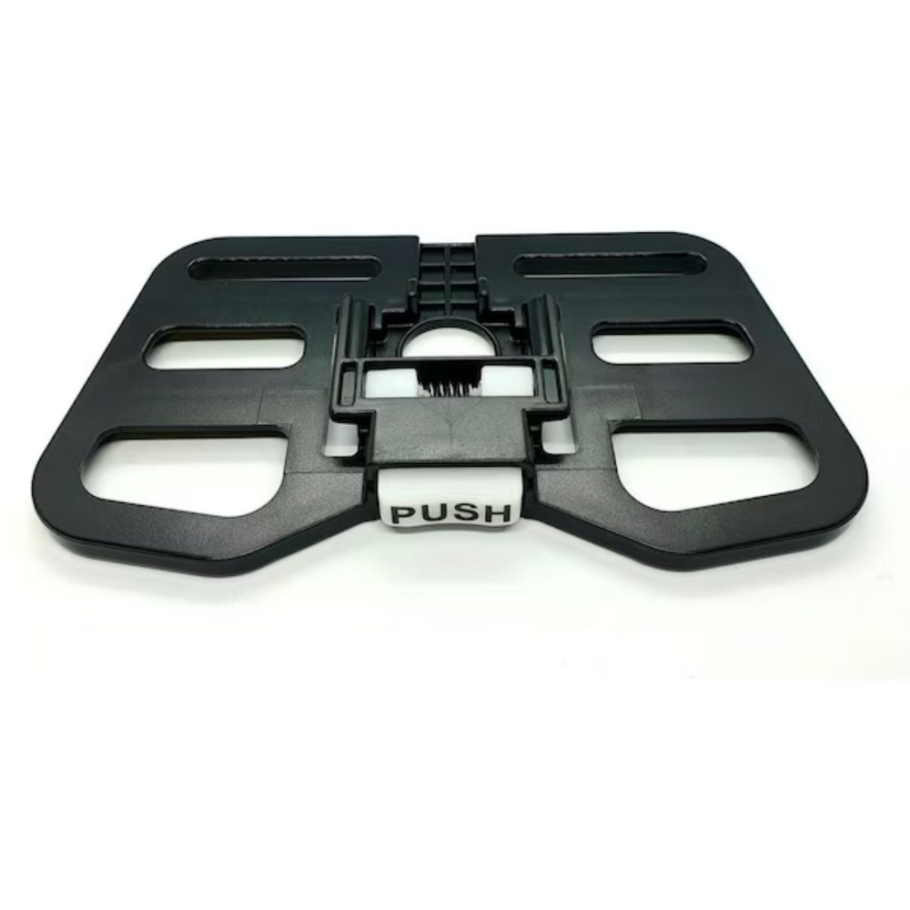 Black plastic component with 'PUSH' label on a white background