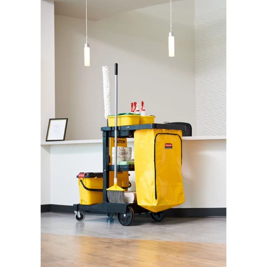 Yellow cleaning cart with supplies in a room setting