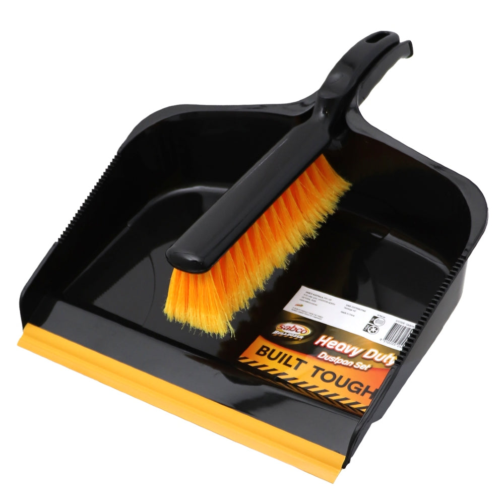 Black dustpan with orange bristle brush on a white background