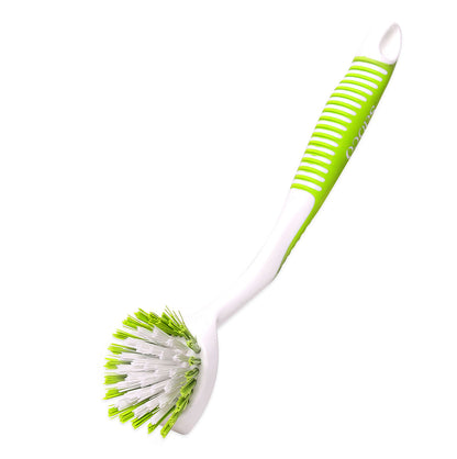 Green and white brush with a handle on a white background