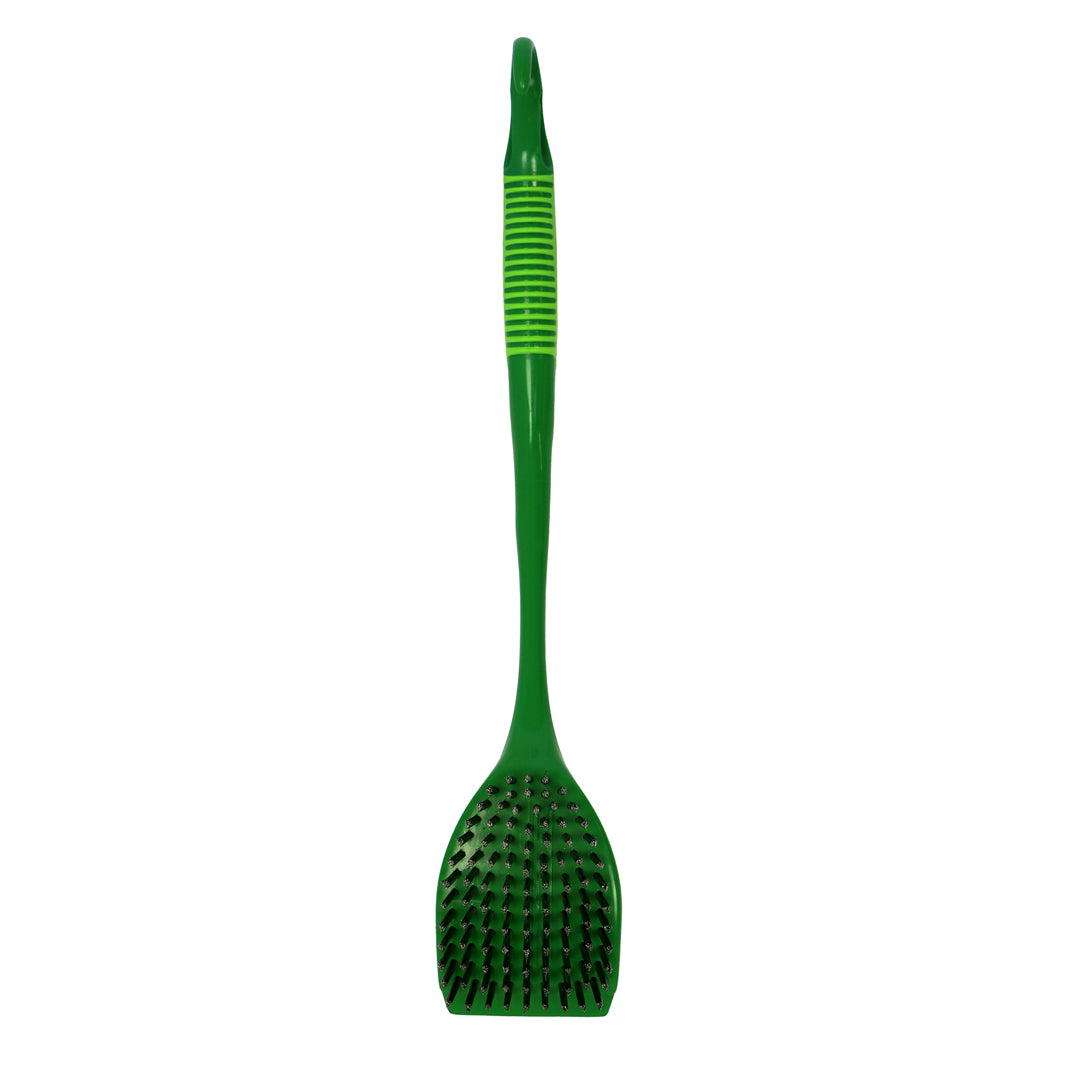 Green BBQ brush with textured head on a white background