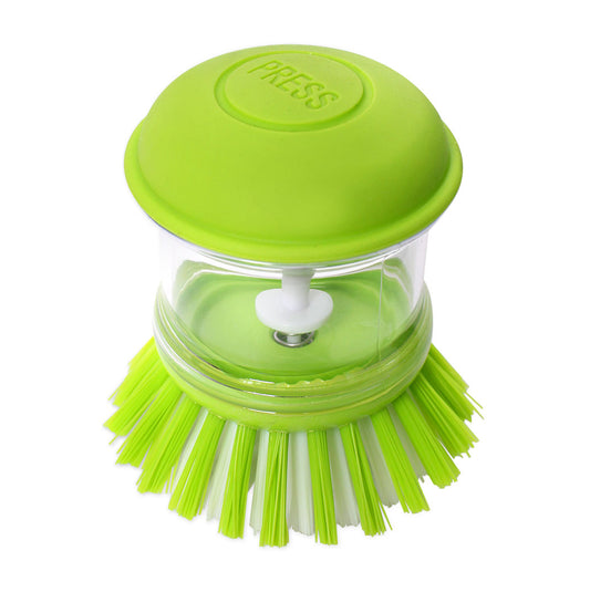 Green dish scrubber with a clear handle on a white background