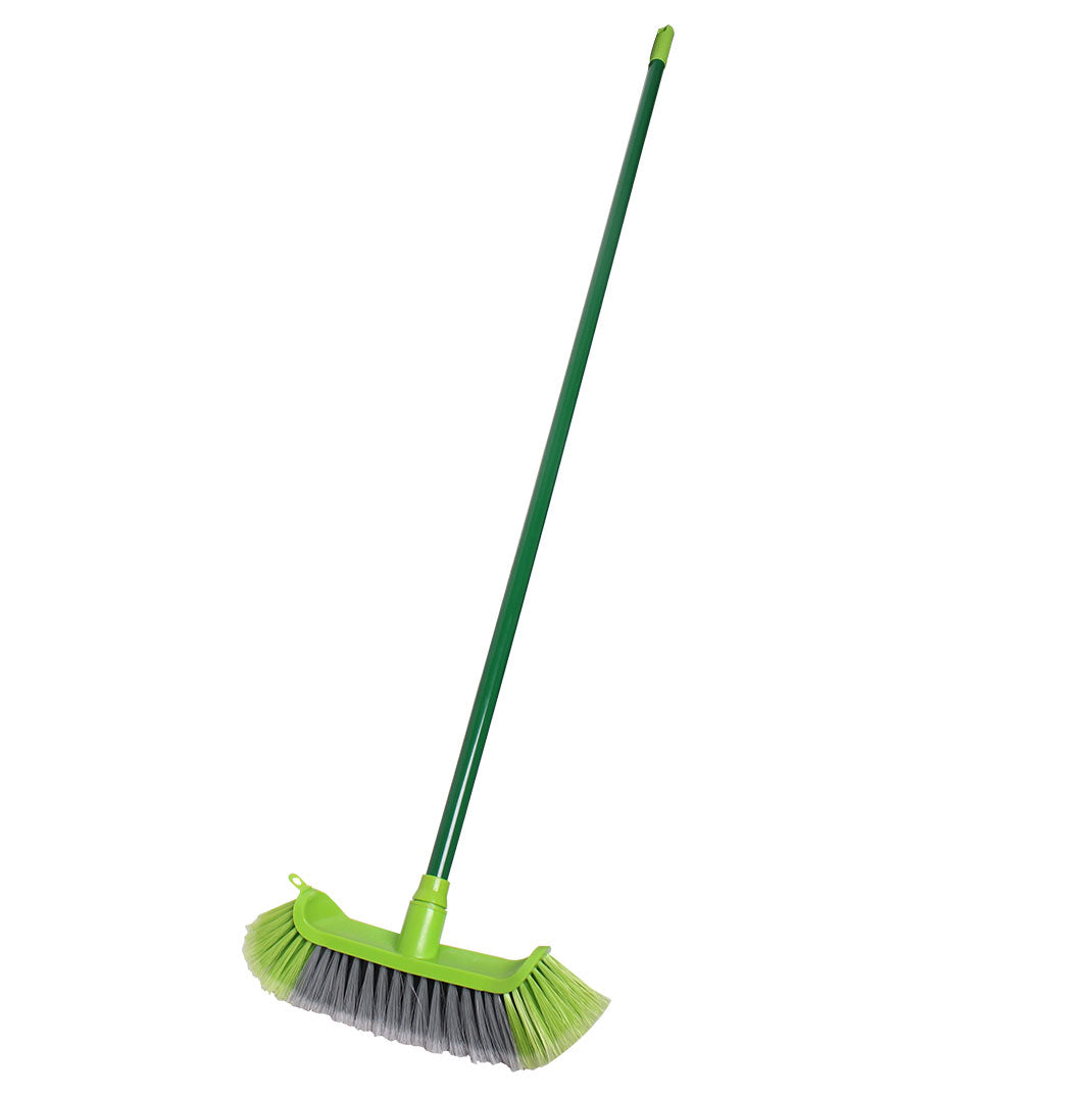 Green broom with a long handle on a white background