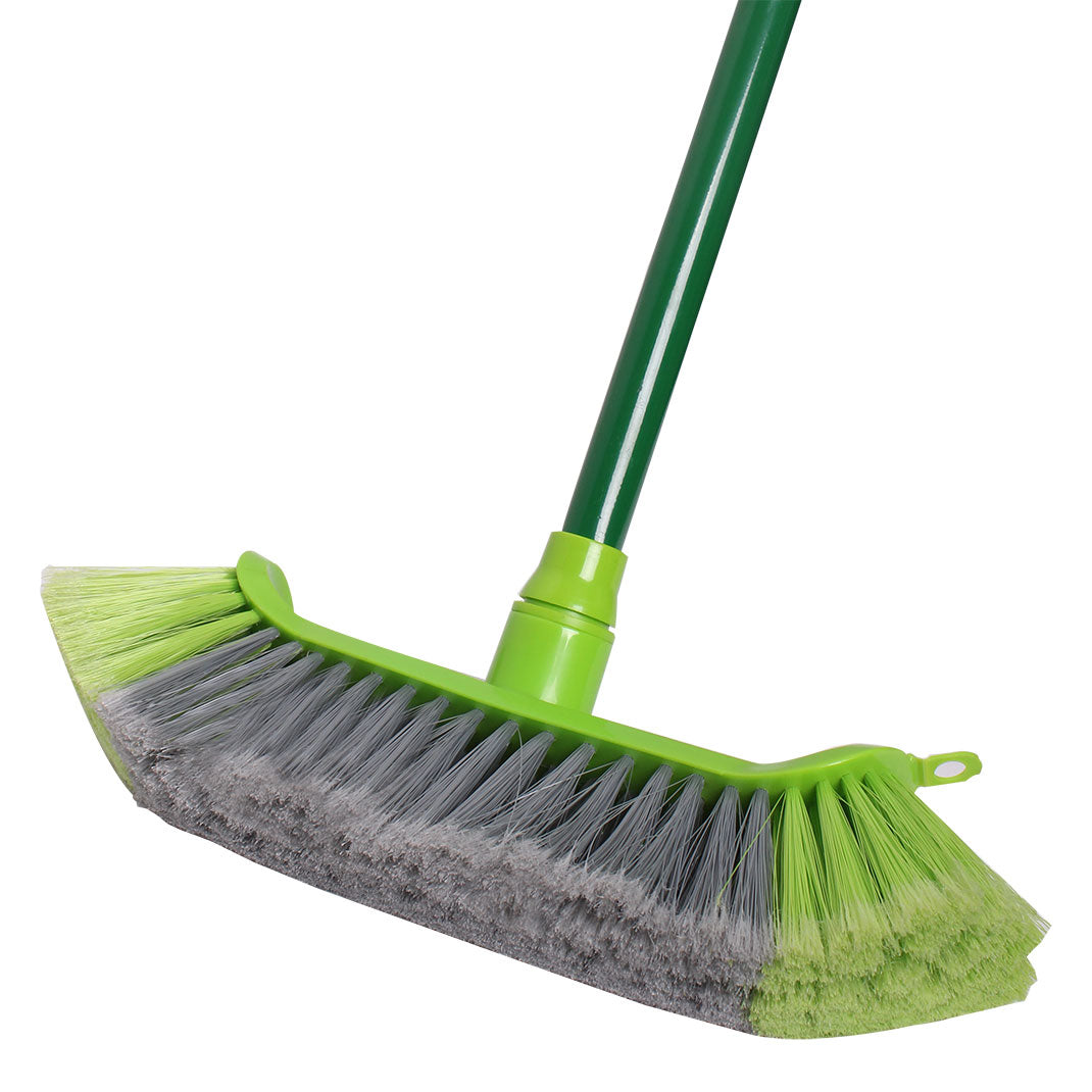 Green and gray broom on a white background