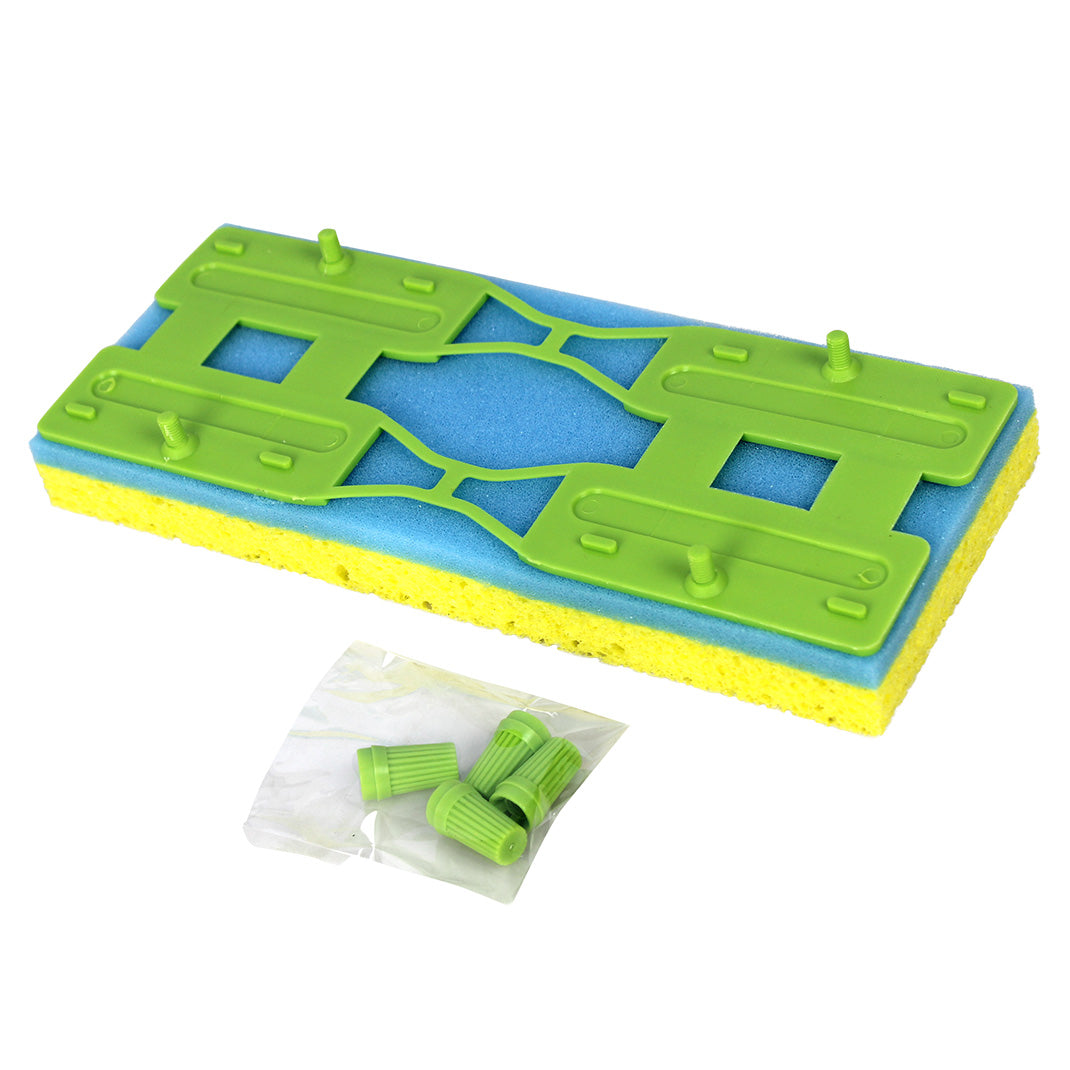 Green and blue sponge mop with small green objects in a clear bag on a white background