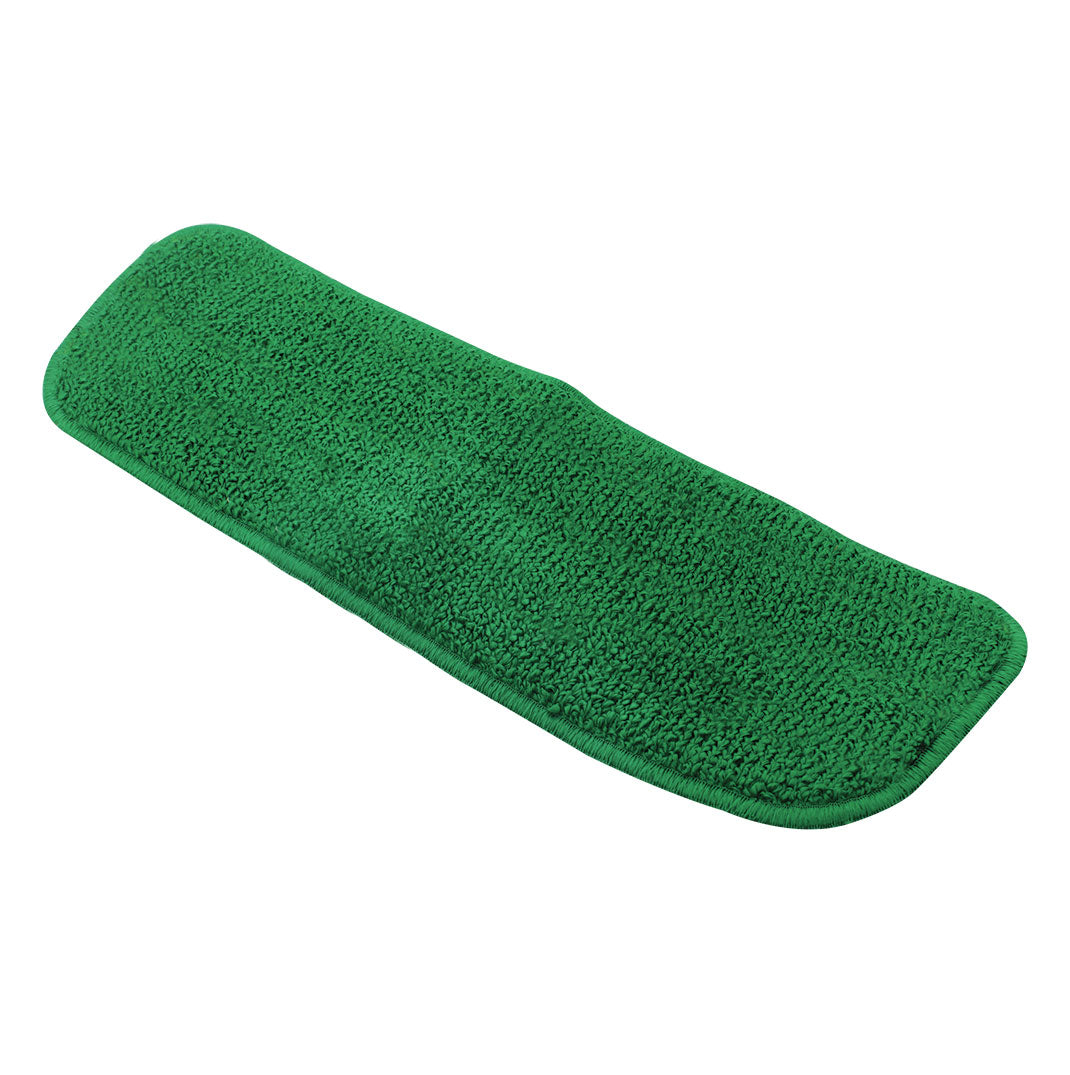Green rectangular cleaning pad on a white background