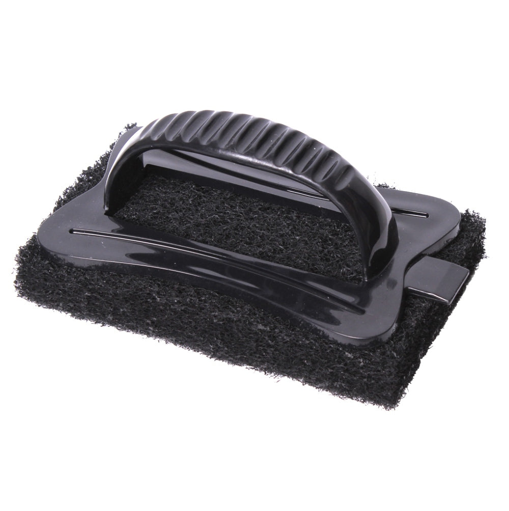 Black scrubber with textured handle on a white background