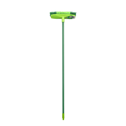 Green broom with a long handle on a white background