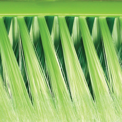 Close-up of green synthetic bristles on a brush