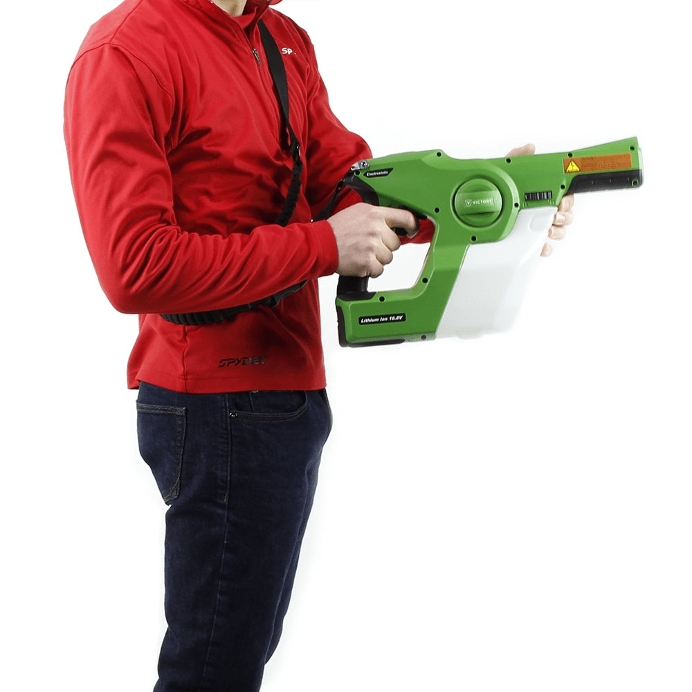 Person wearing a red jacket holding a green and black Victory Electrostatic Sprayer on a white background