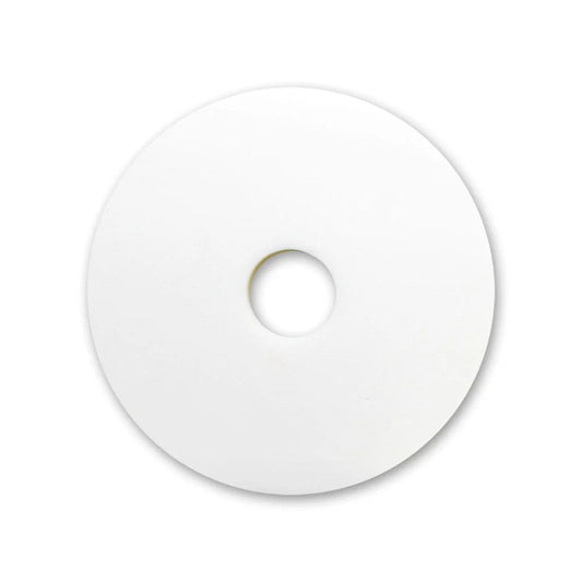 White Magic Sponge Floor Pad with a central hole on a white background