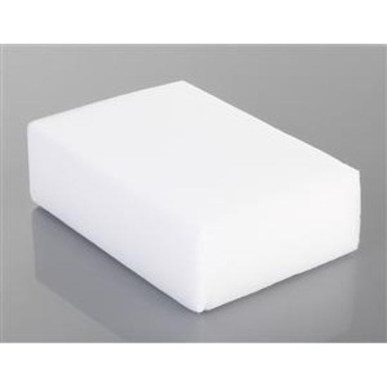 White rectangular sponge on a gray background
